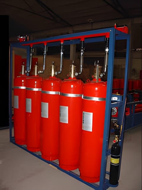 Rack of CO2 fire extinguishers awaiting inspection