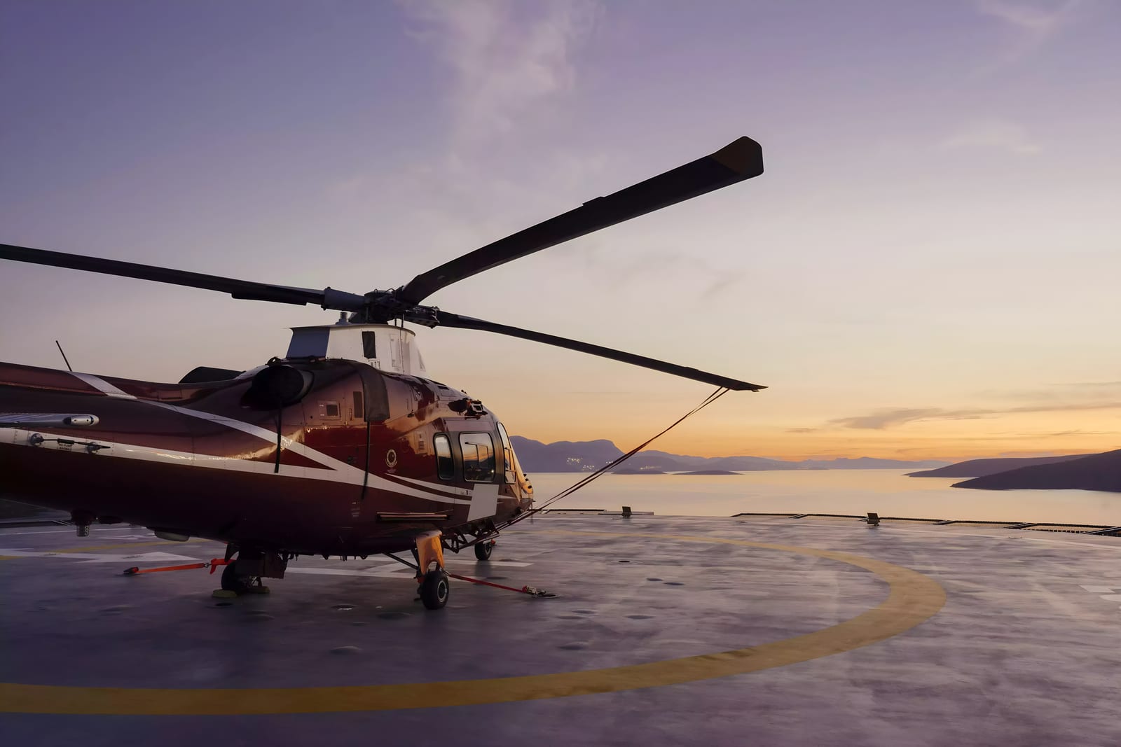 Helicopter in flight over open sea